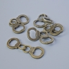 Pendant finding 'Handcuffs', oval 17x11 mm, 5 mm thick, 31 mm long, pack of 5, bronze-colored metal