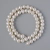 Textured freshwater pearls on thread, 7 mm diameter, 36 cm length