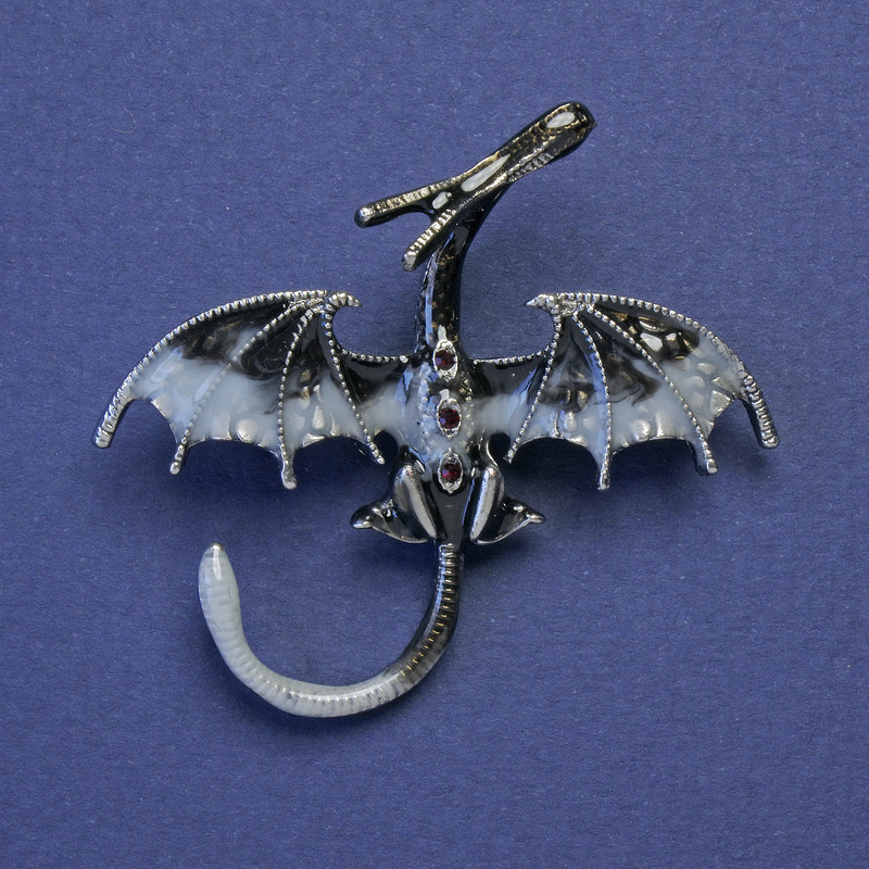 Dragon brooch-pendant, gray-white enamel, red crystals, silver-colored metal, 48×45 mm