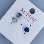 Xuping stud earrings with blue stone in a 'Crown' setting, 6mm, rhodium-plated