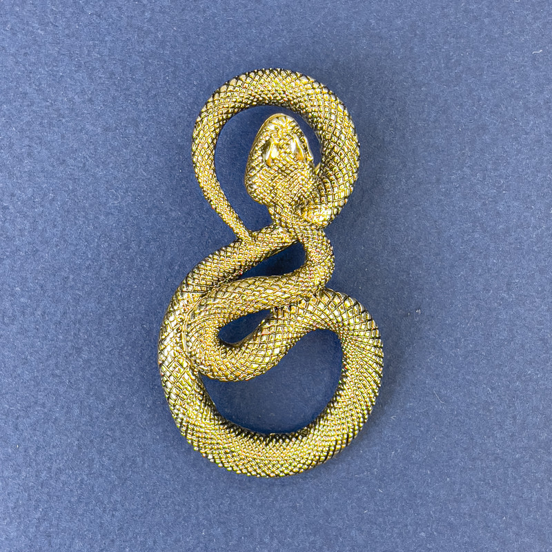 Brooch 'Snake' in gold-tone metal 52×29 mm+