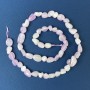 Kunzite lentil beads on thread, 6-12×5-7 mm +/-, length 39 cm+
