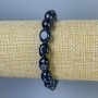 Bracelet with tinted quartz, faceted beads, 12x9 mm diameter, 18 cm length, stretch