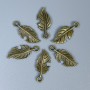Leaf Pendant Finding, Bronze Metal Color, Size 23x10x1mm ± Hole Diameter 2mm ± Packaging 20 g (~26 pcs)