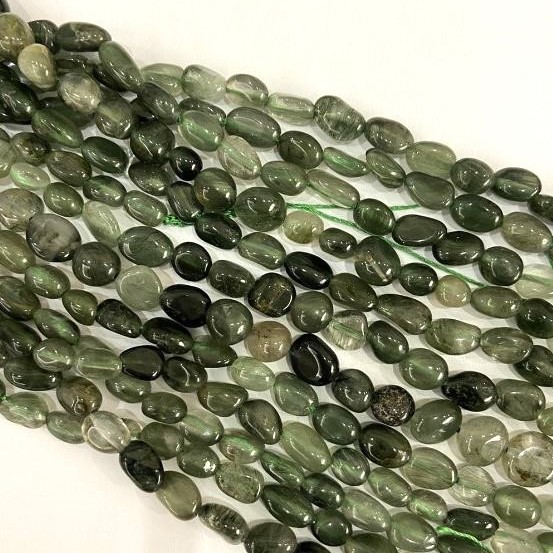 Beads on a thread 'Hairy' Rutile Quartz faceted, 8x6 mm, length 40 cm
