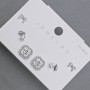 Shamrock-shaped stud earrings with white crystals, silver-tone metal, 10mm+