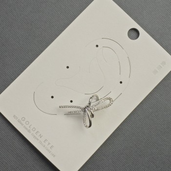 Bow Clip-On Earring in Silver Metal with White Crystals 17x30mm +/-