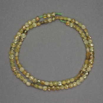 Beads of natural green garnet, coin-shaped, faceted, diameter 4x2 mm +-, length 40 cm +-
