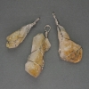Unpolished Citrine Pendant in Weave 60x40x18 mm ± Assorted Sizes