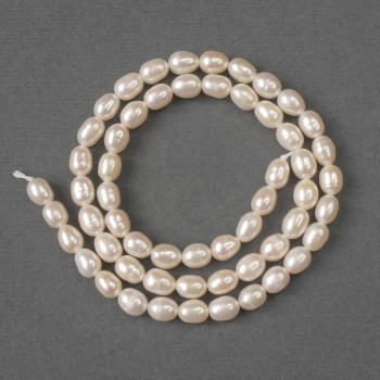 Beads of natural river pearls, oval 6x5 mm, on a thread