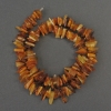Amber-chip beads, diameter 9–14×3 mm, length 39 cm, on a thread