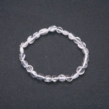 Bracelet of natural rock crystal on elastic, tumbled beads, bead size 7×9 mm (±), circumference 18 cm