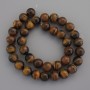 Tiger's Eye beads on beading thread, diameter 10mm+-, length 37cm+