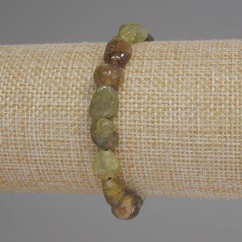 Bracelet with green grossular garnet, faceted beads, diameter 9-12×9 mm, length 18 cm, stretch