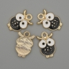 Owl pendant with white and black enamel on gold-tone metal, diameter 12×19 mm, pack of 4