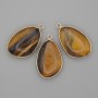 Pendant Tiger's Eye in a gold-tone metal setting 21x35 mm+