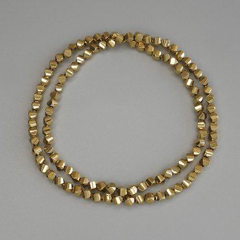 Gold-colored hematite beads, diamond-shaped 4×4 mm, on a beading thread, length 40 cm+