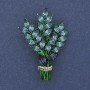 Brooch 'Twig' with blue and white rhinestones, gold-tone metal, 43×29mm +