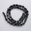 Czech Crystal Beads on thread, black matte, faceted diamond-shaped, 9x5mm +/-, 41cm +/-