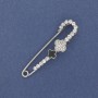 Shamrock Brooch Pin with White Rhinestones, 58 × 15 mm, silver-tone metal