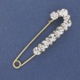Brooch pin with white crystals, 79×20 mm, gold-tone metal