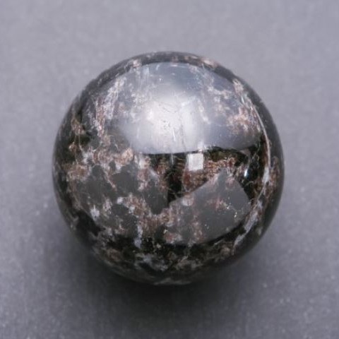 Nuummite sphere, diameter 67 mm ±, weight 484 g