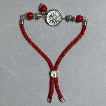 Textile Bracelet, cord diameter 5.5 mm +/-; adjustable slip closure; Coral faceted bead 8 mm +/- with silver metal insert, diameter 17 mm +/-