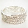 Spiral bracelet with five turns, white crystals, circumference 18–22 cm