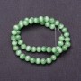 Natural stone beads on thread, cat's-eye light green, 8 mm diameter, 37 cm length