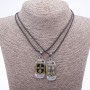 Twin pendant of friendship Love on a cord, length 45 cm, metal color 'silver and bronze'
