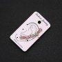 Gold-tone ear cuff with white flowers, multicolored crystals