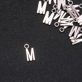 Pendant finding Letter 'M' 17x7mm packaging 20 g (+/- 15 pcs.)