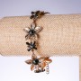 Evening bracelet 'Lilies' with black crystals, antique gold color, width 25mm, length 19-25 cm