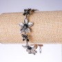 Evening bracelet 'Lilies' with black crystals, color 'antique silver', width 25mm, length 19-25cm