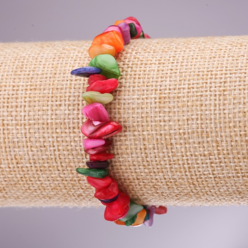 Bracelet made from multicolored mother-of-pearl on elastic, diameter 5-8 mm, length 18 cm