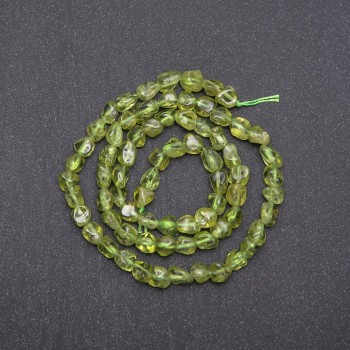 Beads on a thread of natural chrysoprase, faceted, diameter 6x5 mm ±, length 40 cm