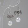 Bow pendant earrings with faux pearls and rhinestones (silver-tone metal) 3.7 x 1.5 cm