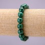 Bracelet made of natural malachite — smooth bead, diameter 10 mm (±), on elastic cord, length 18 cm
