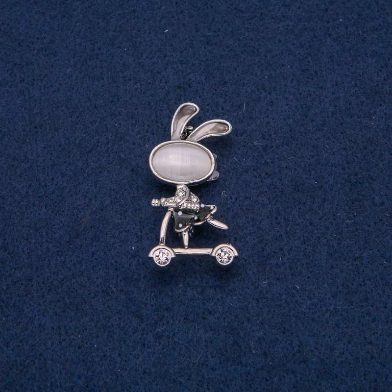Brooch 'Bunny on a Scooter' with white crystals, silver-toned metal, black enamel, Cat's Eye cabochon (silver) 43x21 mm +