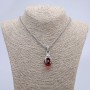 Pendant 'Paw with Ball' red 45x15mm on a chain, length 70cm, silver-toned metal