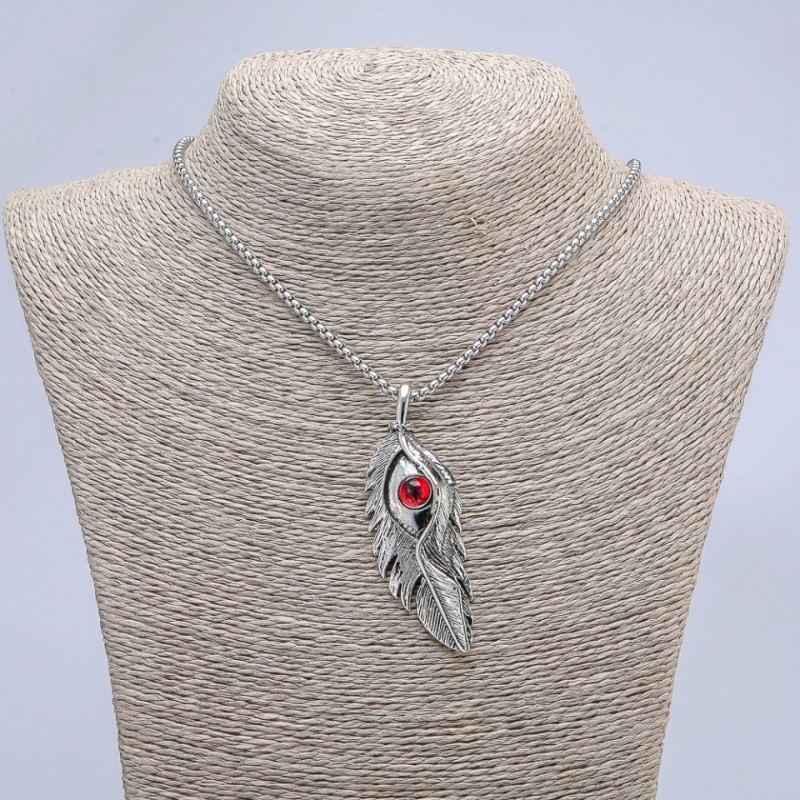 Pendant 'Feather with Dragon Eye' 65x23mm on chain, length 70cm +/- silver-toned metal