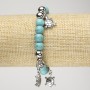 Turquoise bracelet (artificial) on elastic, 8 mm diameter +/- with silver inserts and turtle shapes, length 18 cm+