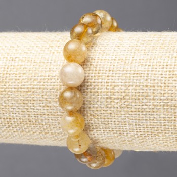 Elastic bracelet of natural Rutile Quartz with smooth beads, diameter 10± mm