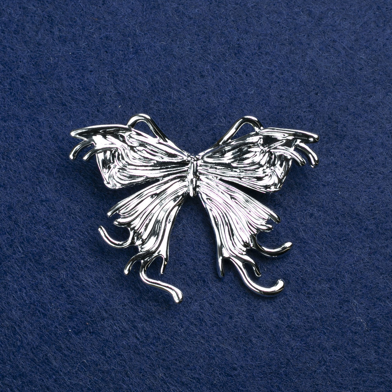 Butterfly Brooch in silvery metal, 50×36 mm