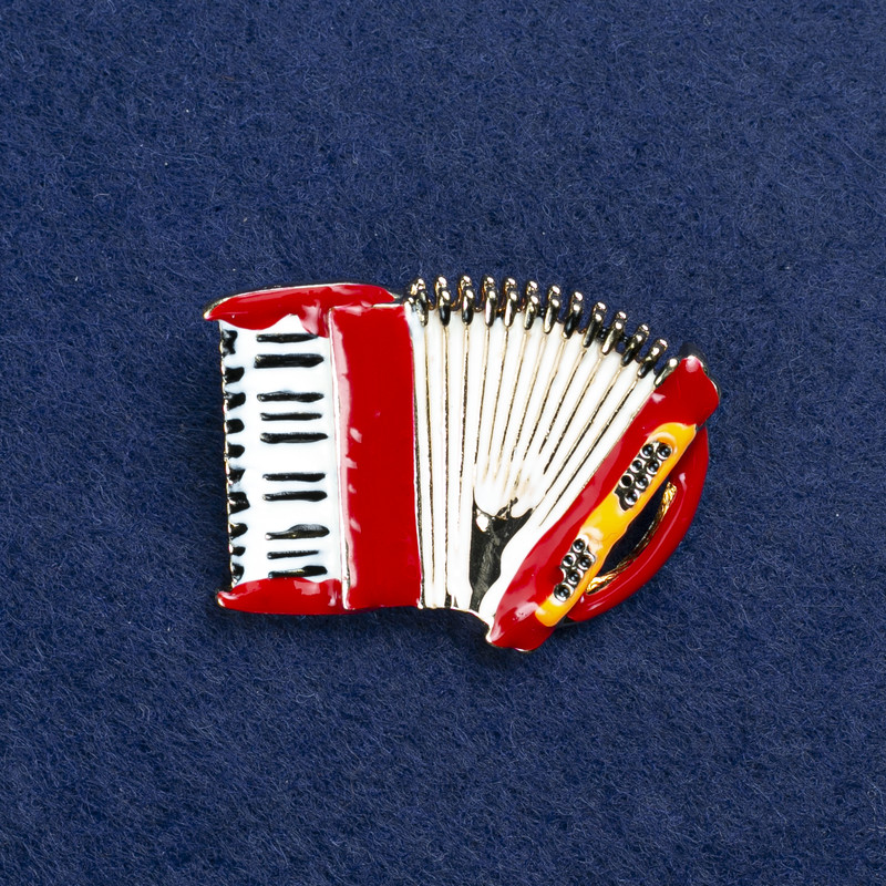 Brooch 'Bayan' gold-tone metal and enamel 40x28 mm +