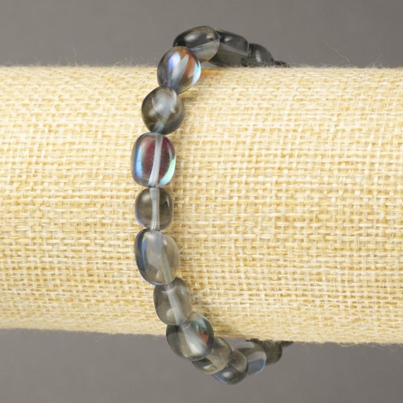 Elastic bracelet with blue opal glass, faceted beads 10×8 mm+