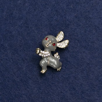 Brooch 'Bunny' in golden metal, enamel and crystals 24x21 mm +