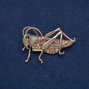 Brooch 'Grasshopper' gold-tone metal with black and yellow rhinestones 57x38 mm +