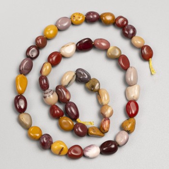 Beads Mookaite Jasper, hammered finish, on thread, 7×10mm diameter, length 40 cm