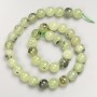 Prehnite beads, smooth round on thread, diameter about 10 mm, length about 38 cm